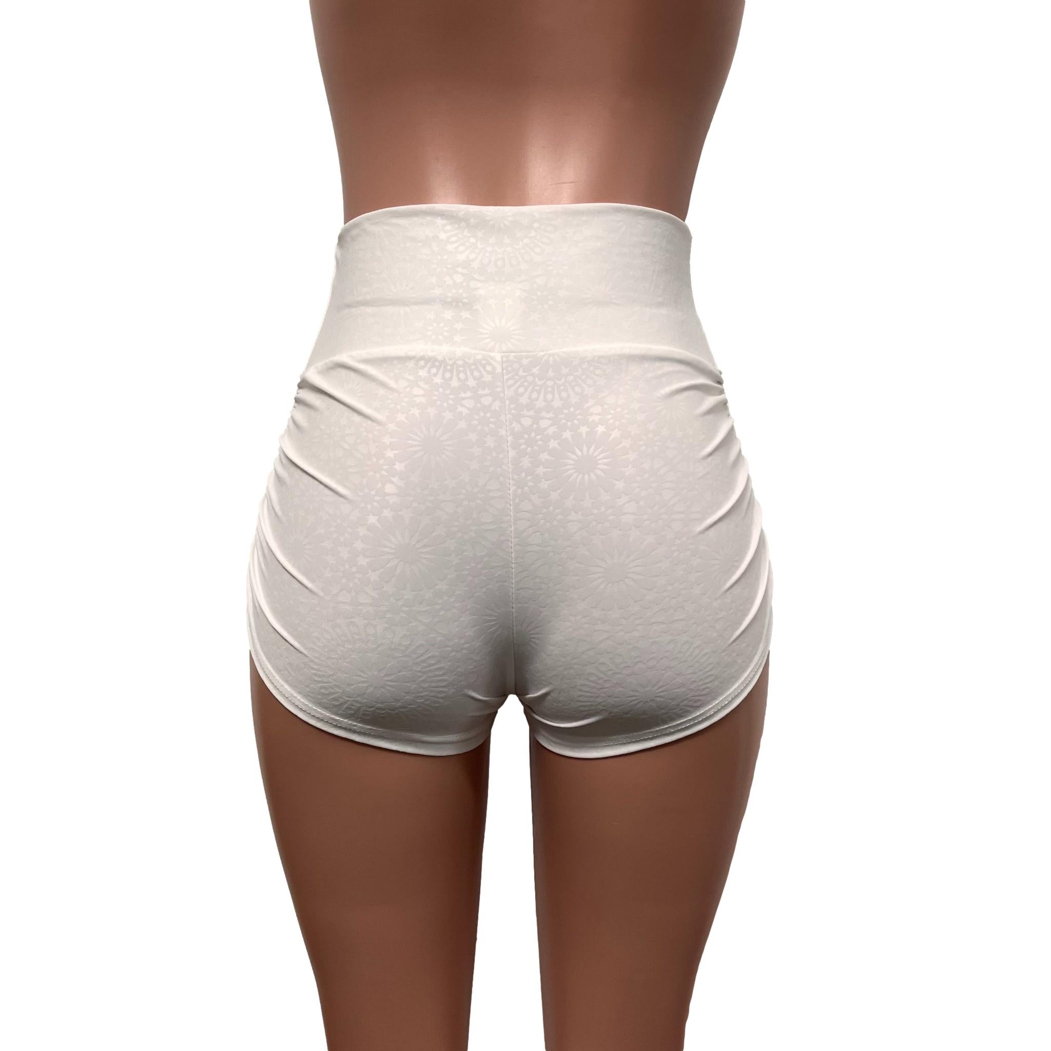 https://peridotclothing.com/cdn/shop/products/white-embossed-ruched-booty-shorts-back_2400x.jpg?v=1663070555